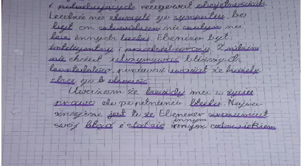 Ręcznie pisany tekst fioletowym długopisem na kratkowanym papierze.