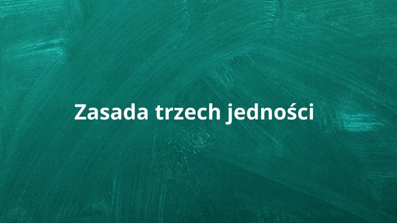 Napis "Zasada trzech jedności" na zielonym tle tablicy.